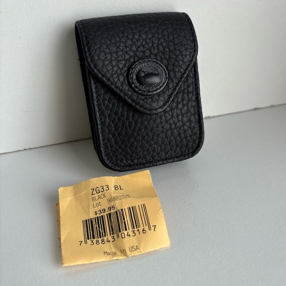 Dooney & Bourke Handbags - Dooney & Bourke all weather leather Snap Button Strap Caddy Purse bag accessory